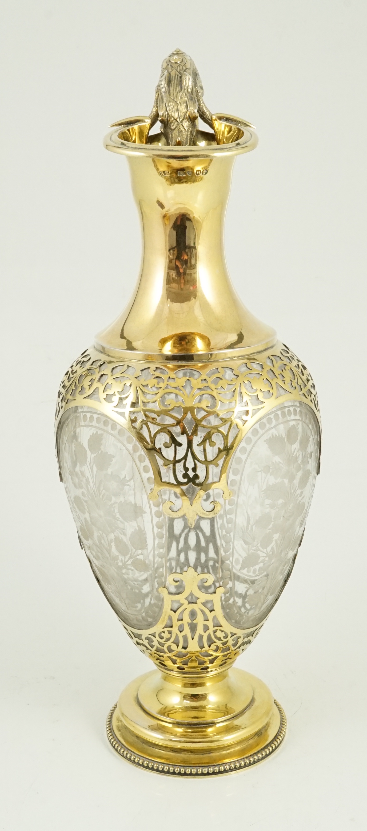 A good Victorian silver gilt mounted etched glass claret jug, by Goldsmiths Alliance
